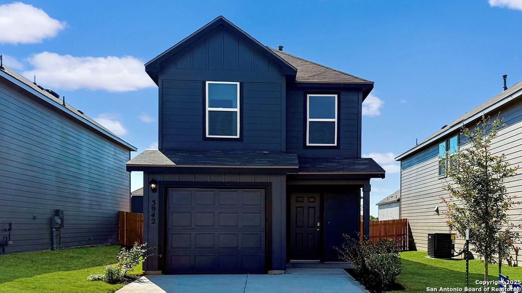 Front exterior of a new home in Blue Ridge Ranch, San Antonio, TX, highlighting curb appeal (Image 1). Front exterior of a new home in Blue Ridge Ranch, San Antonio, TX, highlighting curb appeal (Image 1).
