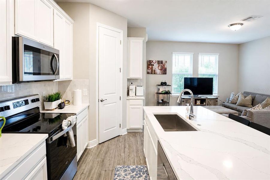 Furnished interior view inside a new home in Highland Ridge, Winter Garden (Image 11).