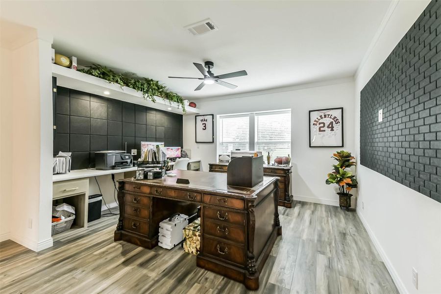 Game room being used as home office.