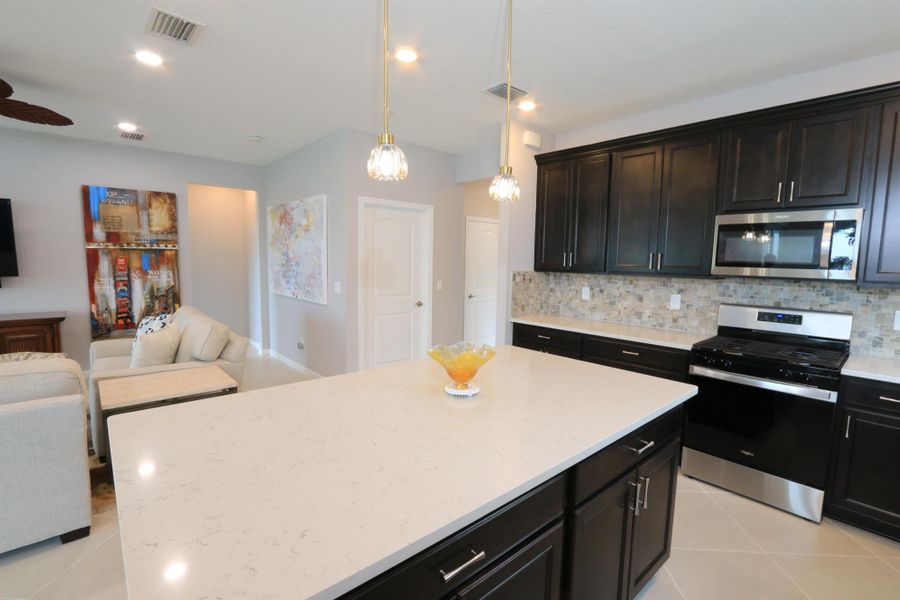 Furnished interior view inside a new home in , Port St. Lucie (Image 26).