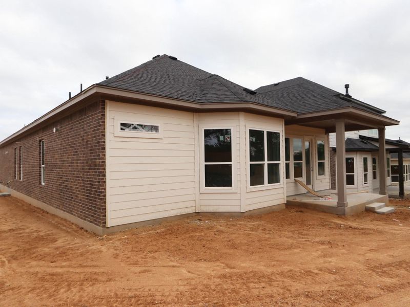 Exterior details and patio area of a home in Heritage, Dripping Springs (Image 1). Exterior details and patio area of a home in Heritage, Dripping Springs (Image 1).