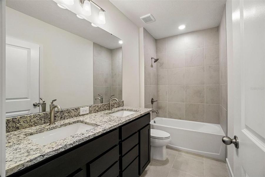 Furnished interior view inside a new home in Willowbrook North, Winter Haven (Image 9). Furnished interior view inside a new home in Willowbrook North, Winter Haven (Image 9).