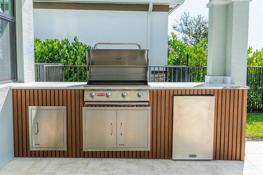 Exterior details and patio area of a home in Tesoro Club, Port St. Lucie (Image 29).