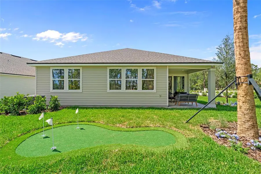 Exterior details and patio area of a home in Reserve East, Flagler Beach (Image 4).