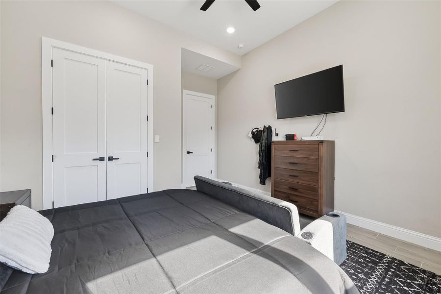 Bedroom view highlighting closet access. Bedroom view highlighting closet access.