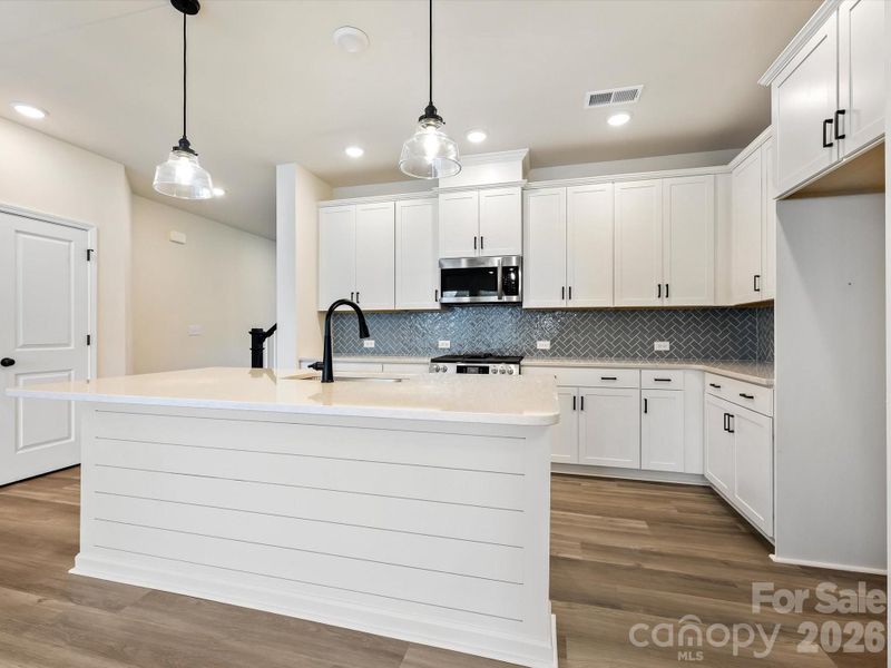 Furnished interior view inside a new home in North Creek Village - Townhomes, Huntersville (Image 8).