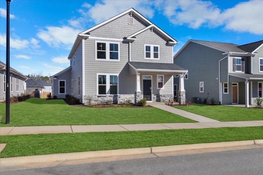 Front exterior of a new home in Tillery Park, Grovetown, GA, highlighting curb appeal (Image 22). Front exterior of a new home in Tillery Park, Grovetown, GA, highlighting curb appeal (Image 22).