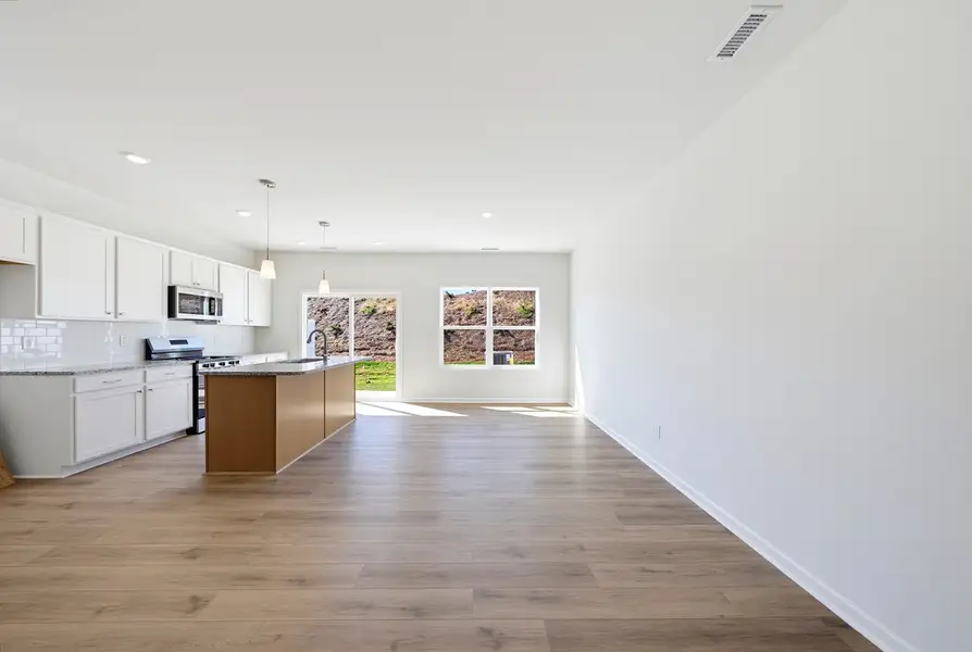 Spacious, unfurnished interior of a new home in Sweetbrier, Durham (Image 14).