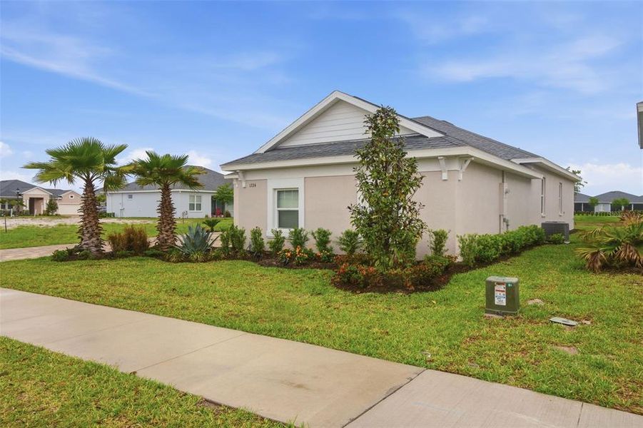 Front exterior of a new home in , Deland, FL, highlighting curb appeal (Image 21).