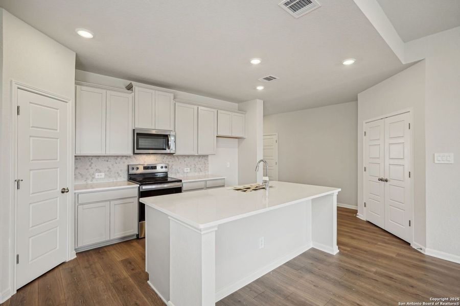Furnished interior view inside a new home in Sagebrooke - Premier Series, San Antonio (Image 4). Furnished interior view inside a new home in Sagebrooke - Premier Series, San Antonio (Image 4).