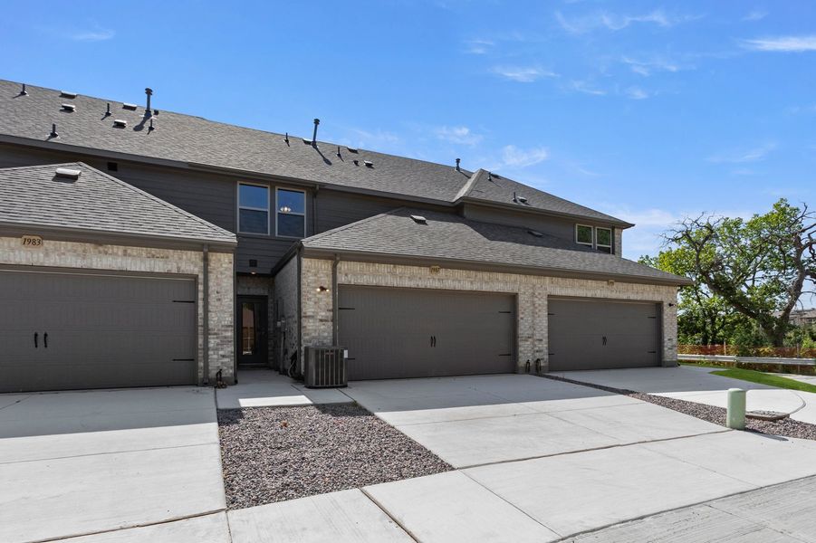 Front exterior of a new home in Timber Ridge, Corinth, TX, highlighting curb appeal (Image 28). Front exterior of a new home in Timber Ridge, Corinth, TX, highlighting curb appeal (Image 28).