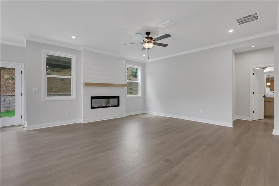 Spacious, unfurnished interior of a new home in The Paddocks at Doc Hughes, Buford (Image 39).