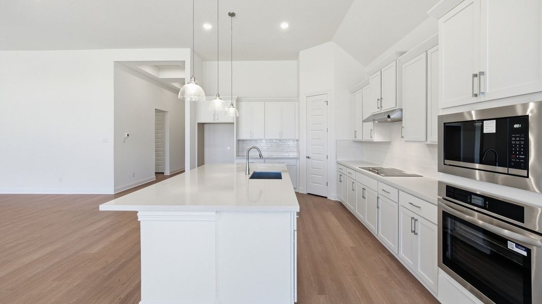 Furnished interior view inside a new home in Oaks at San Gabriel, Georgetown (Image 7).