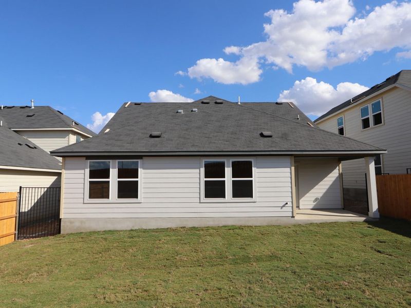 Exterior details and patio area of a home in Cascades at Onion Creek, Austin (Image 16).