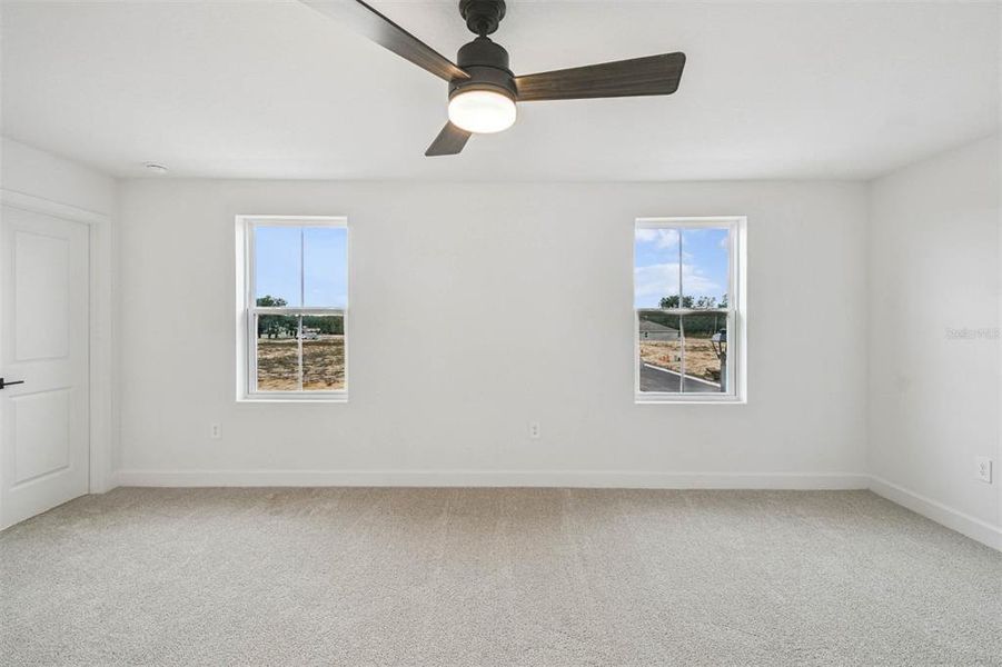 Spacious, unfurnished interior of a new home in Aspire at Canter Creek, Davenport (Image 27).