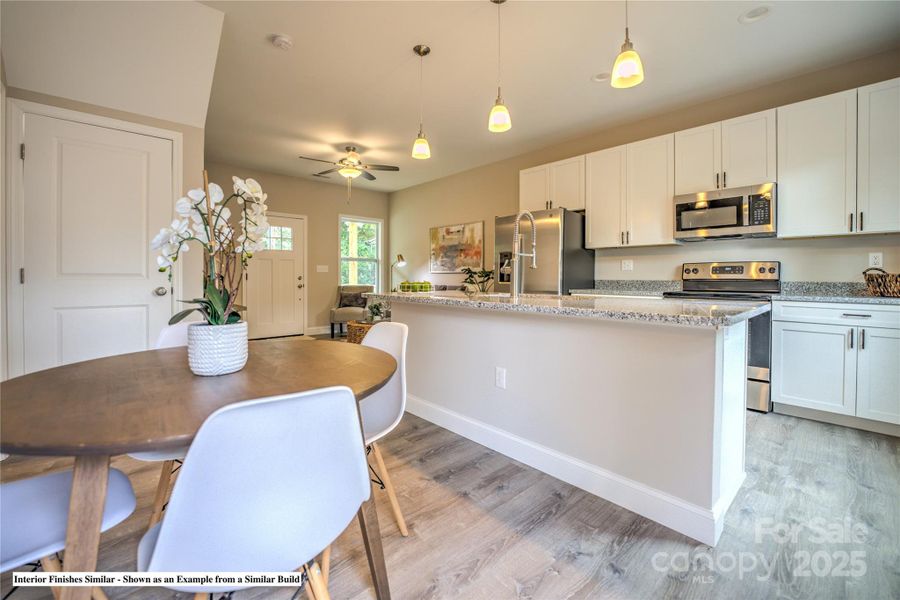 Furnished interior view inside a new home in , Waynesville (Image 25). Furnished interior view inside a new home in , Waynesville (Image 25).