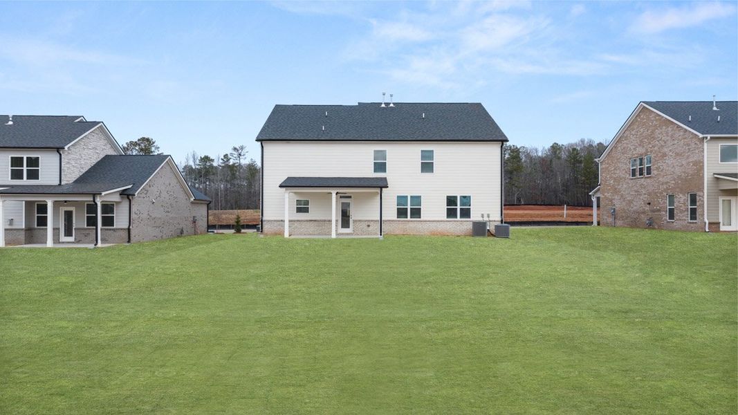 Exterior details and patio area of a home in The Gates at Pates Creek, Hampton (Image 4).