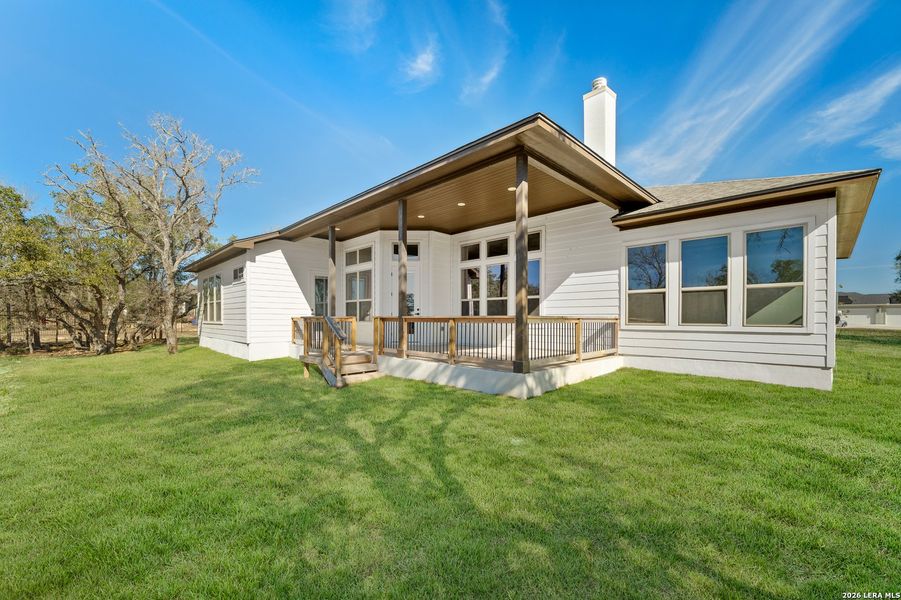 Exterior details and patio area of a home in Potranco Acres, Castroville (Image 3).