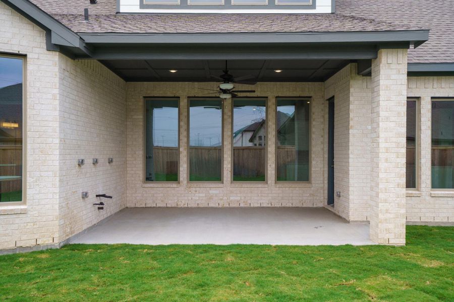 Exterior details and patio area of a home in Bridgeland, Cypress (Image 3).