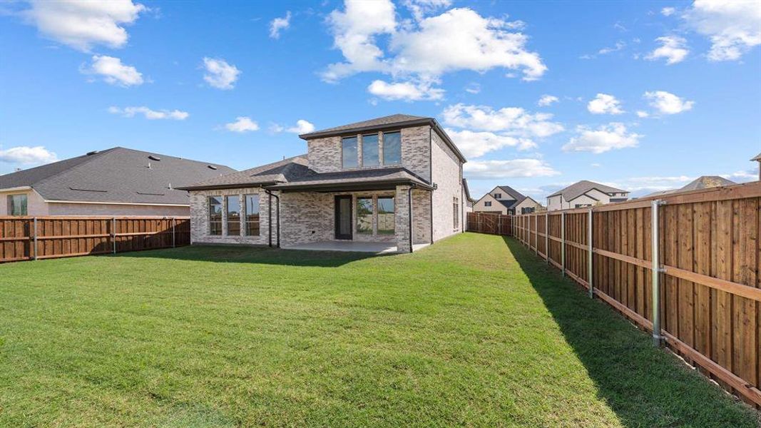 Exterior details and patio area of a home in Trinity Falls 45', McKinney (Image 4). Exterior details and patio area of a home in Trinity Falls 45', McKinney (Image 4).