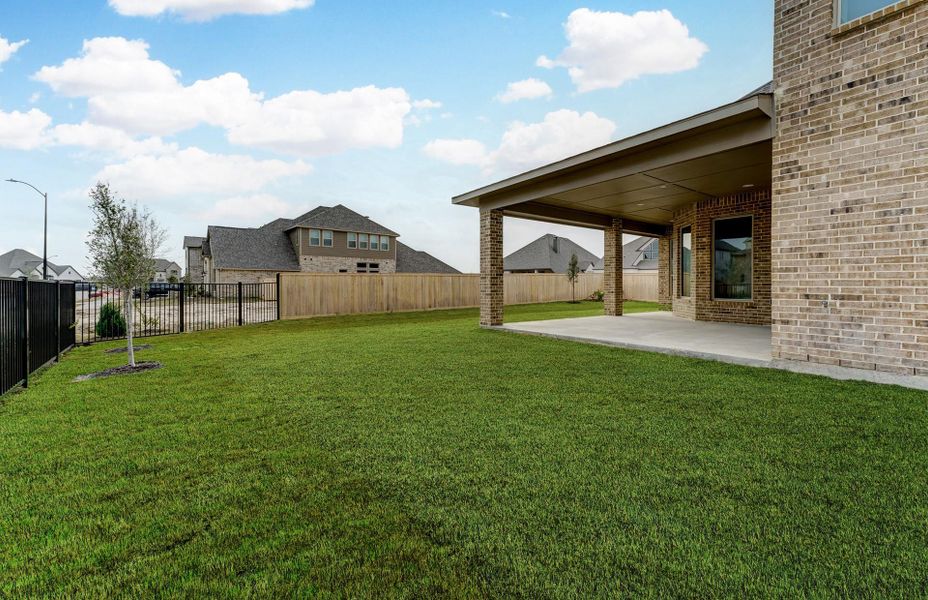 Exterior details and patio area of a home in Bridgeland 60′, Cypress (Image 28).