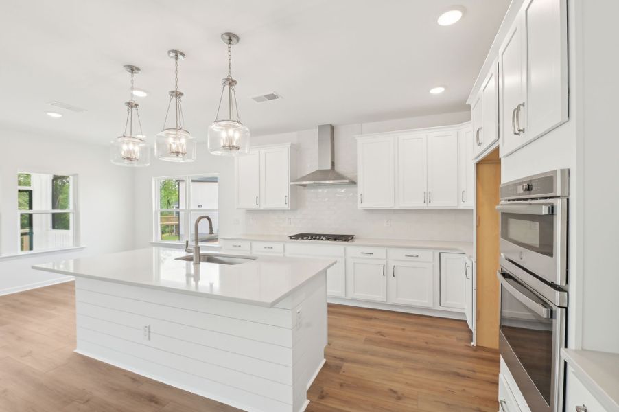 Representative furnished interior of a home built from the Alexis by Ashton Woods in Rowland's Grant, Fuquay Varina (Image 11).
