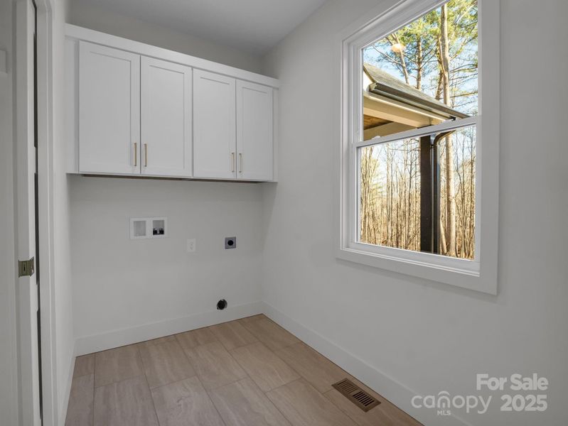 Laundry has Utility Closet with pocket door Laundry has Utility Closet with pocket door