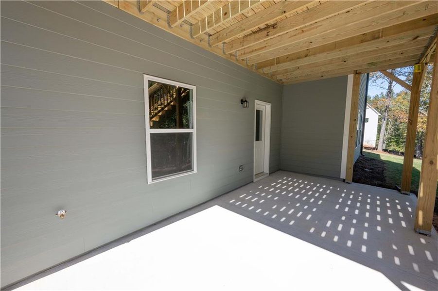 Exterior details and patio area of a home in Woodland Hills, Loganville (Image 3). Exterior details and patio area of a home in Woodland Hills, Loganville (Image 3).