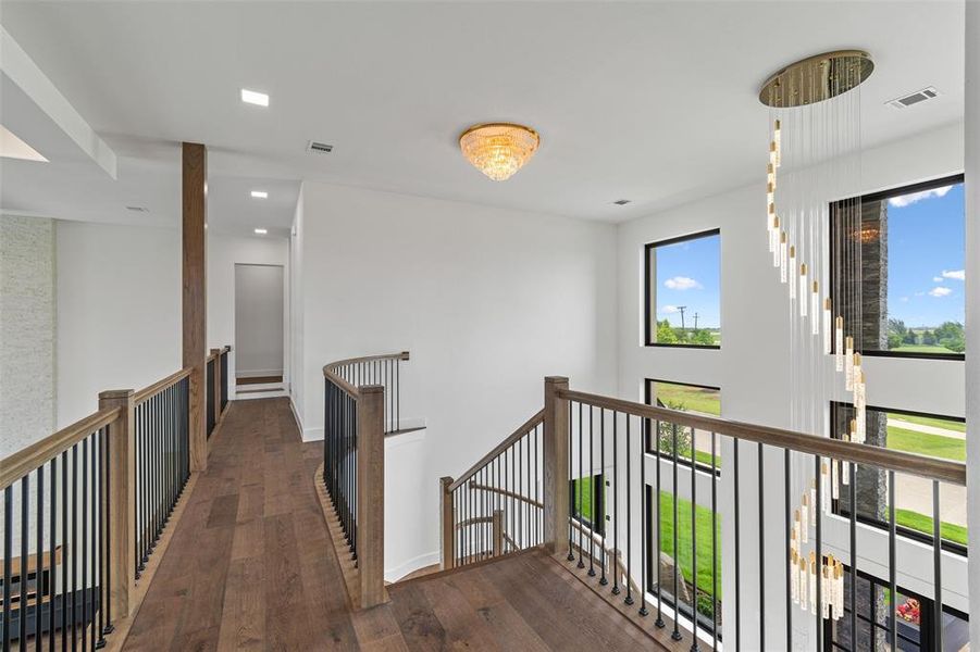 Hall featuring dark wood-type flooring