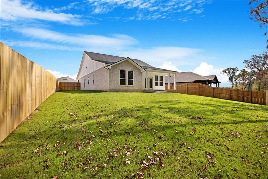 Exterior details and patio area of a home in , Lindale (Image 22).