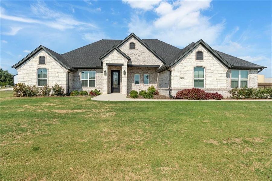 Front exterior of a new home in , Weatherford, TX, highlighting curb appeal (Image 21).