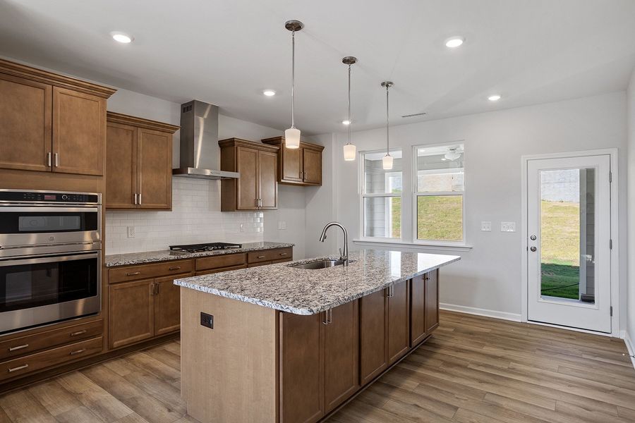 Furnished interior view inside a new home in Ovation at Sweetbrier, Durham (Image 9).
