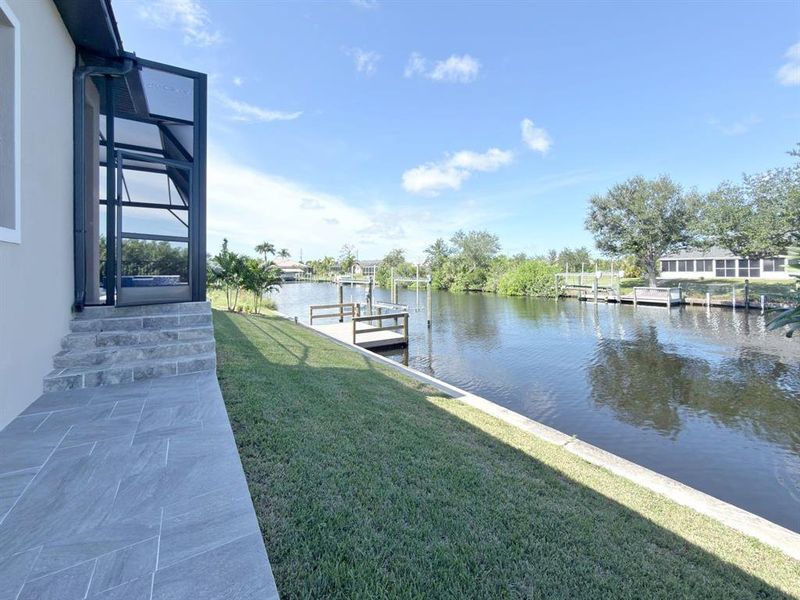Exterior details and patio area of a home in , Port Charlotte (Image 2). Exterior details and patio area of a home in , Port Charlotte (Image 2).
