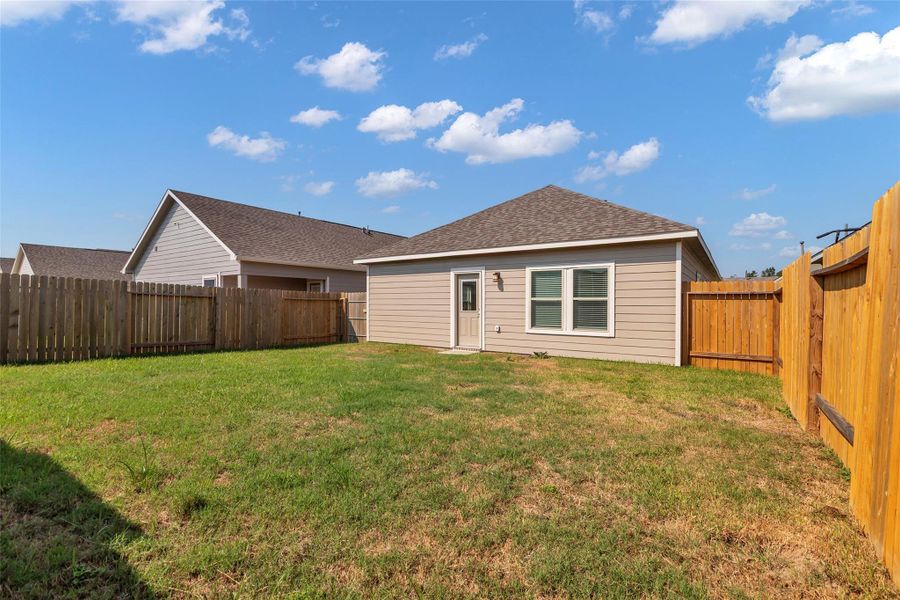 Front exterior of a new home in , Magnolia, TX, highlighting curb appeal (Image 22). Front exterior of a new home in , Magnolia, TX, highlighting curb appeal (Image 22).