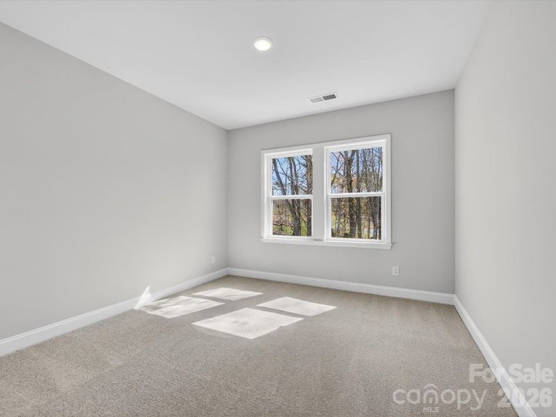 Spacious, unfurnished interior of a new home in North Creek Village, Huntersville (Image 41).