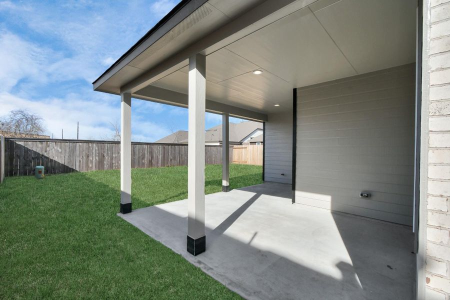 This outdoor space is an ideal canvas for your outdoor living dreams. Sample photo of completed home with similar floor plan. As-built interior colors and selections may vary.