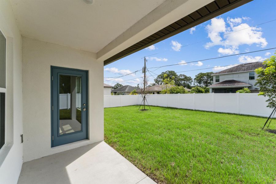 Exterior details and patio area of a home in Aspire at Palm Bay, Palm Bay (Image 26).