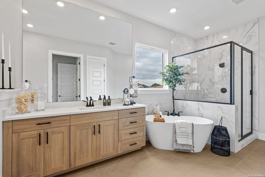 Furnished interior view inside a new home in Village at Three Oaks, Seguin (Image 5).