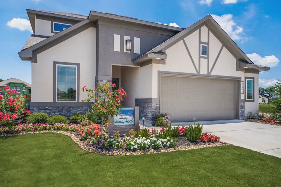 Representative exterior photo of a completed home built from the Carlisle by Chesmar Homes in Stillwater Ranch, Buda, TX (Image 12).
