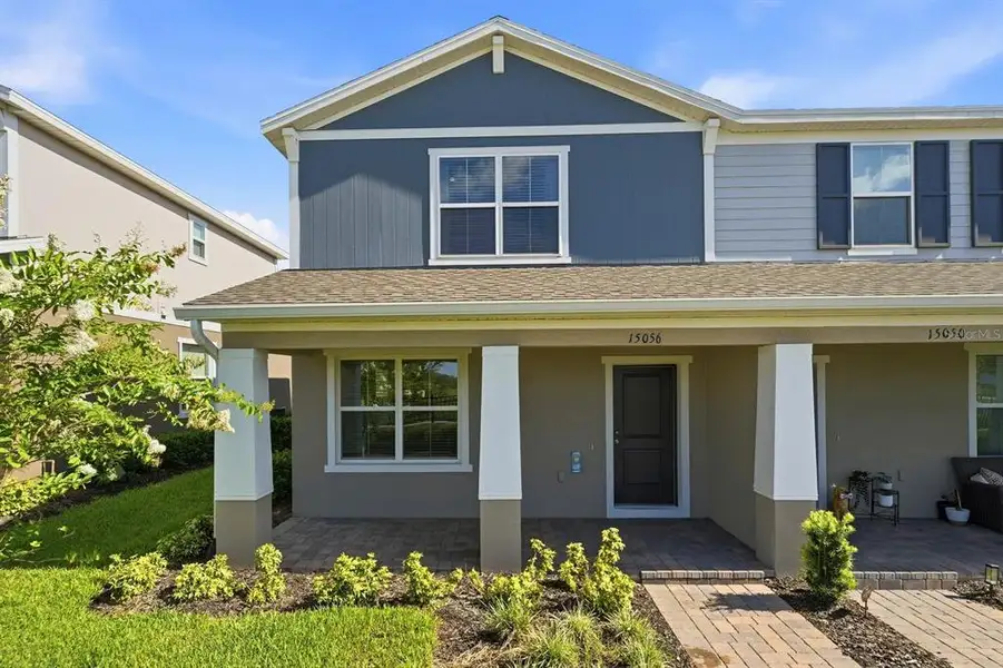 Front exterior of a new home in , Winter Garden, FL, highlighting curb appeal (Image 2). Front exterior of a new home in , Winter Garden, FL, highlighting curb appeal (Image 2).