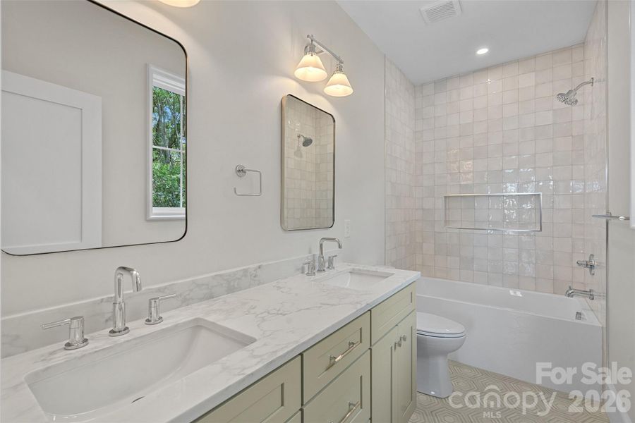 Well appointed guest bath with dual vanity