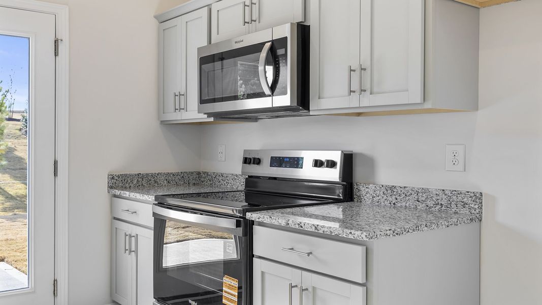 Furnished interior view inside a new home in Tanglewood Townes, Greenville (Image 6).