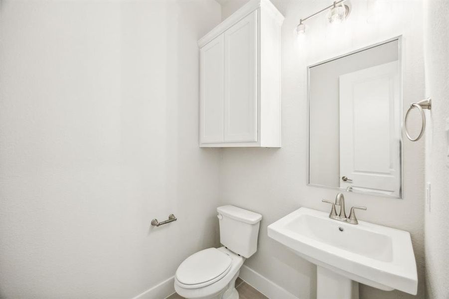 Bathroom with toilet and sink