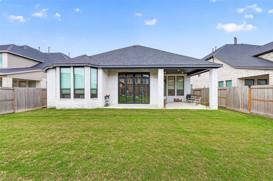 Exterior details and patio area of a home in , Fulshear (Image 28).