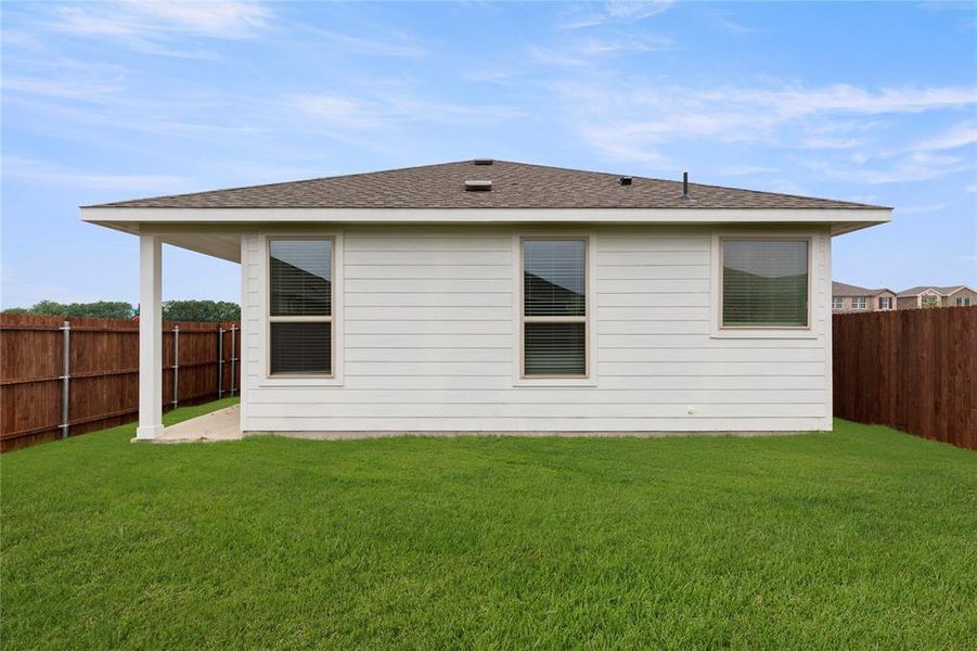 Front exterior of a new home in Creekside Ranch, Blue Ridge, TX, highlighting curb appeal (Image 2).