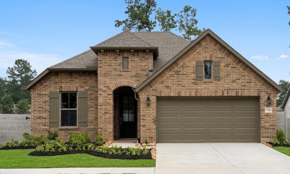 Front exterior of a new home in Two Step Farm, Montgomery, TX, highlighting curb appeal (Image 2). Front exterior of a new home in Two Step Farm, Montgomery, TX, highlighting curb appeal (Image 2).