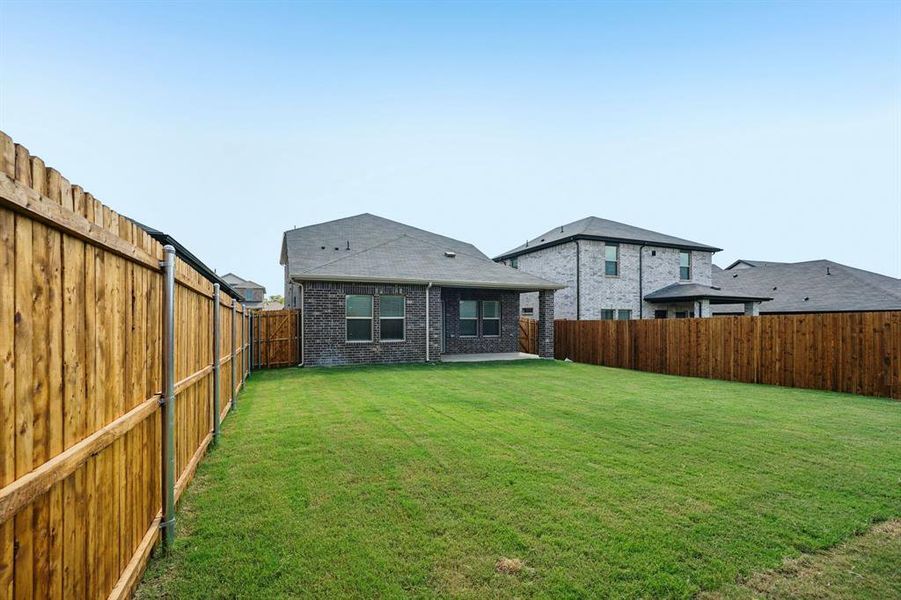 Exterior details and patio area of a home in Simpson Crossing - Spring Series, McKinney (Image 2).