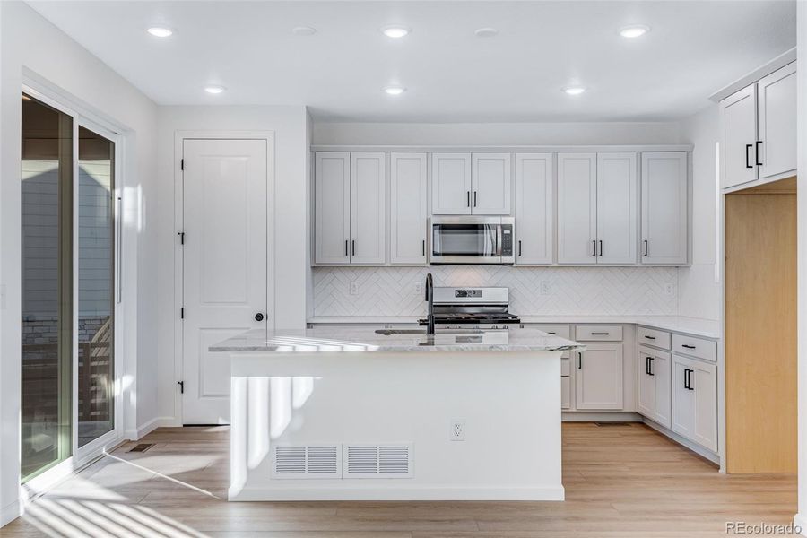 Furnished interior view inside a new home in Painted Prairie, Aurora (Image 18). Furnished interior view inside a new home in Painted Prairie, Aurora (Image 18).