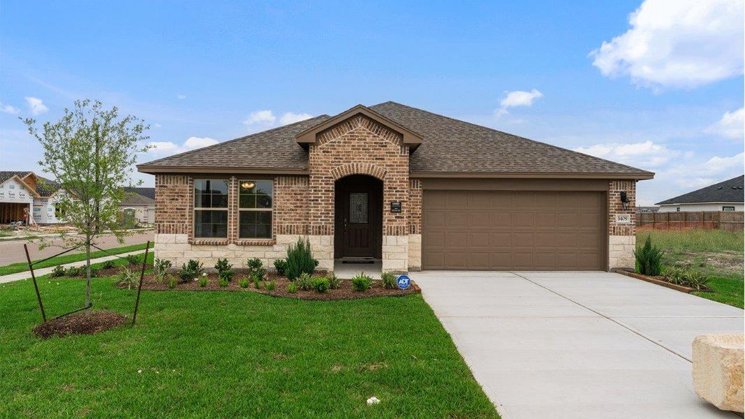 Front exterior of a new home in The Lakes Northwest, Corpus Christi, TX, highlighting curb appeal (Image 1). Front exterior of a new home in The Lakes Northwest, Corpus Christi, TX, highlighting curb appeal (Image 1).