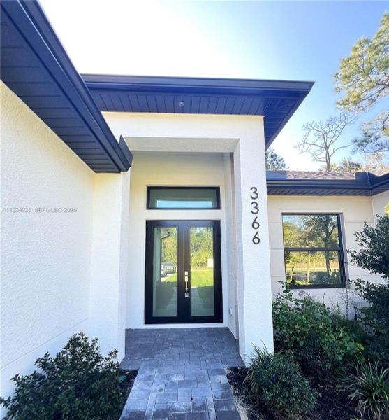 Exterior details and patio area of a home in , Naples (Image 28).
